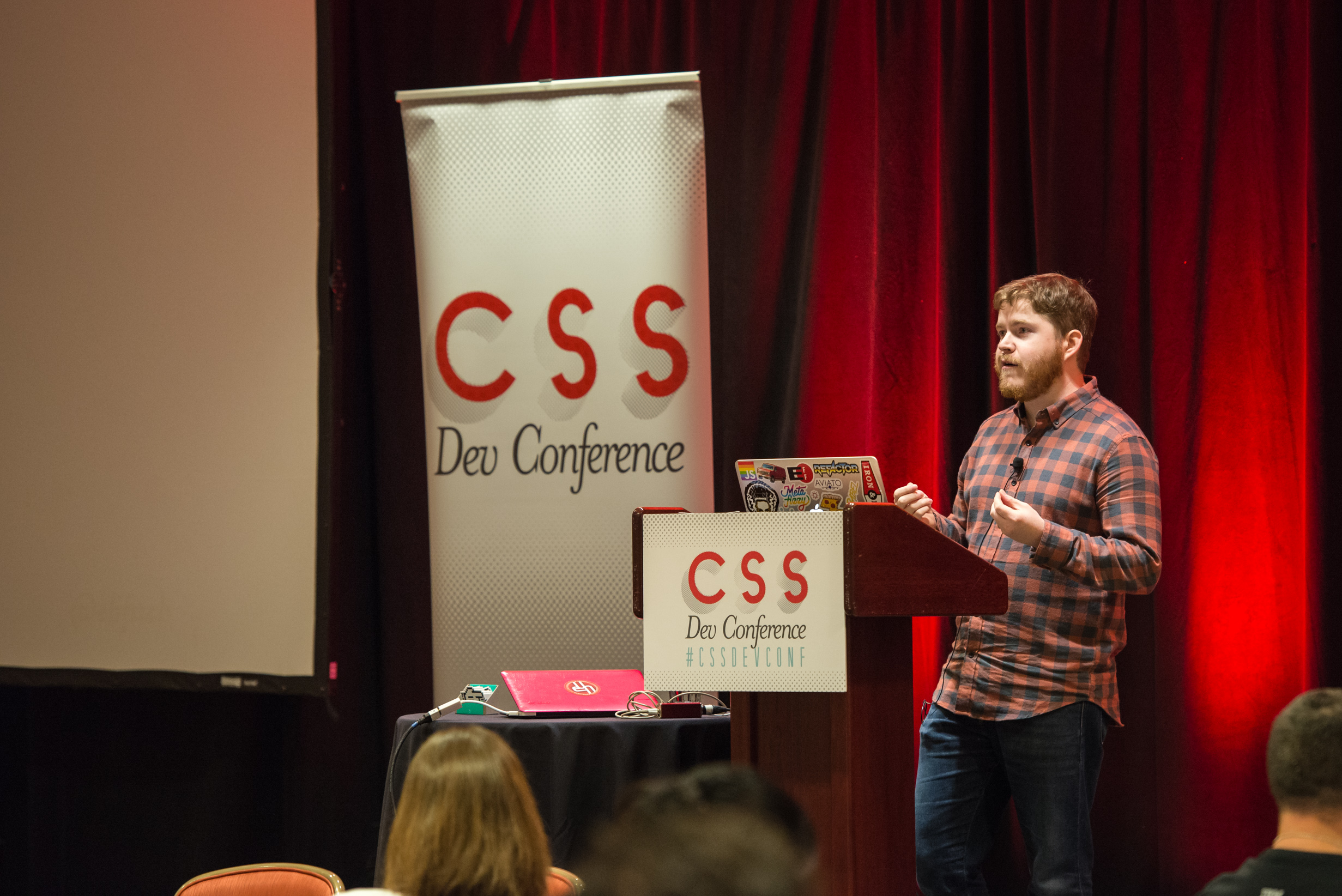 Eli at the lectern speaking at CSS Dev Conf